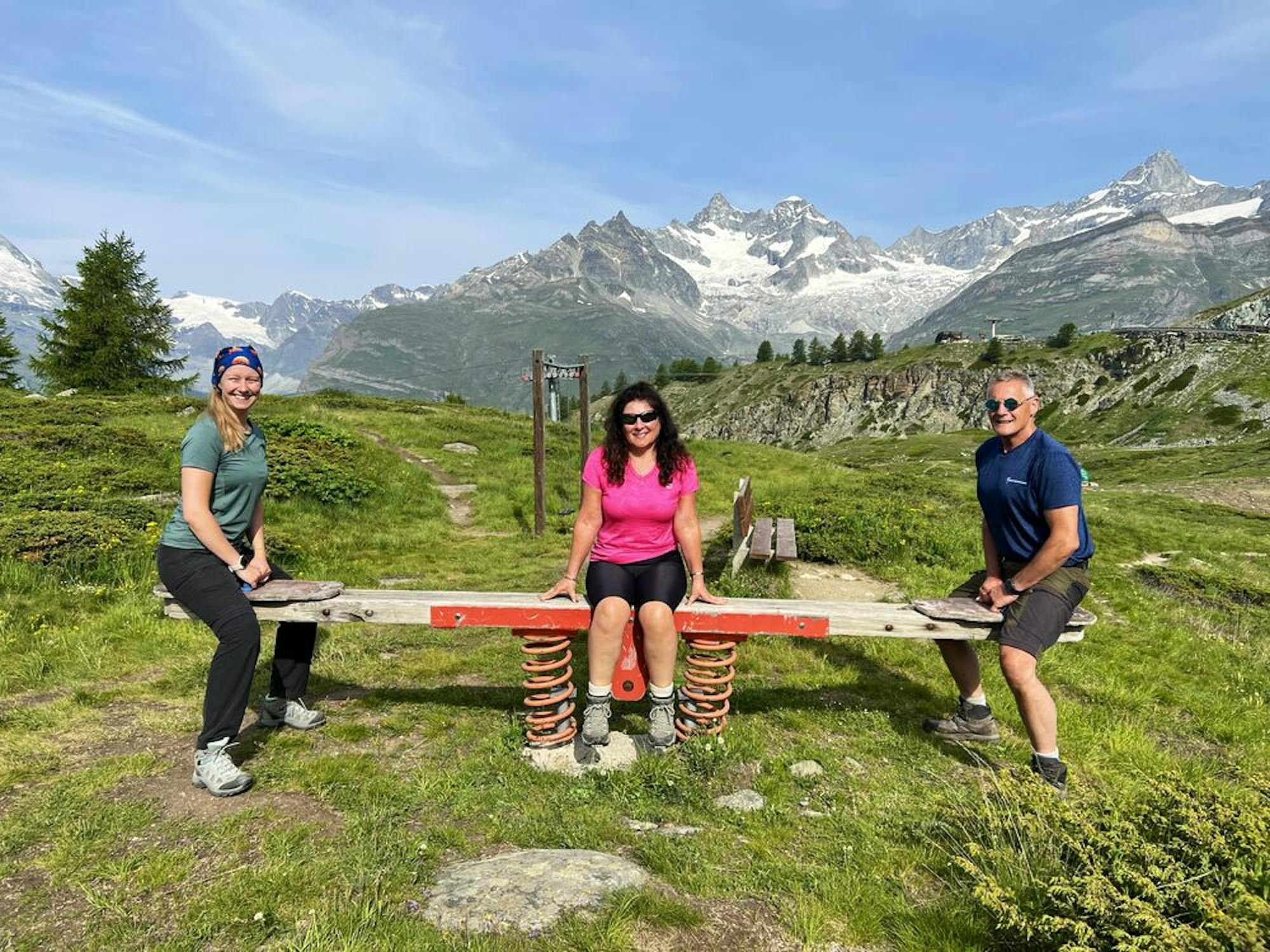 hikers with matterhorn in distance