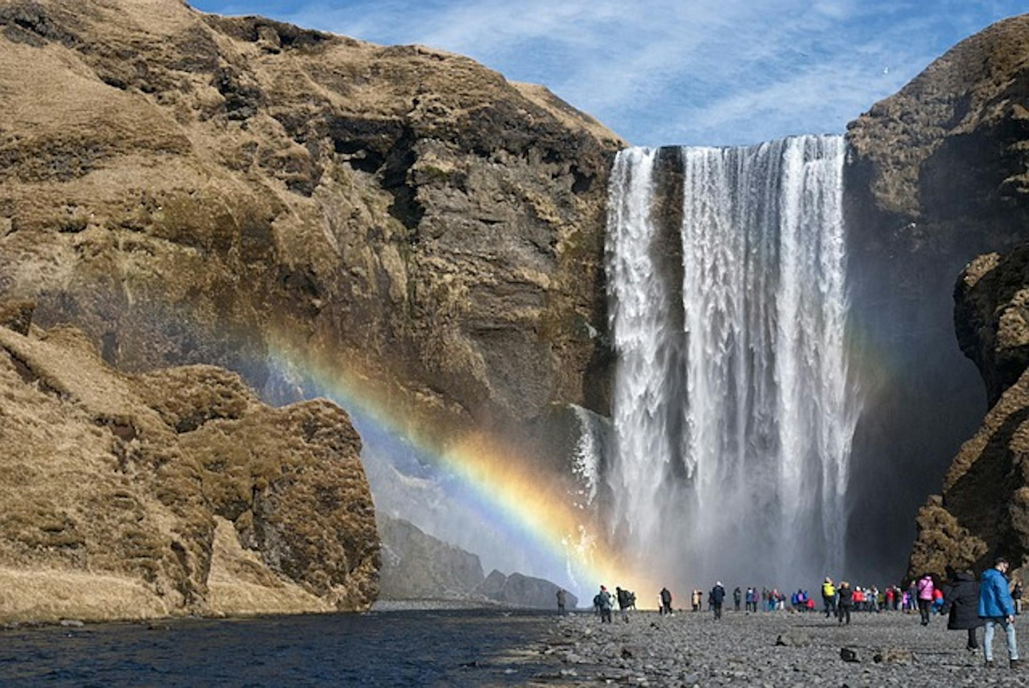 Iceland waterfall with tourists
