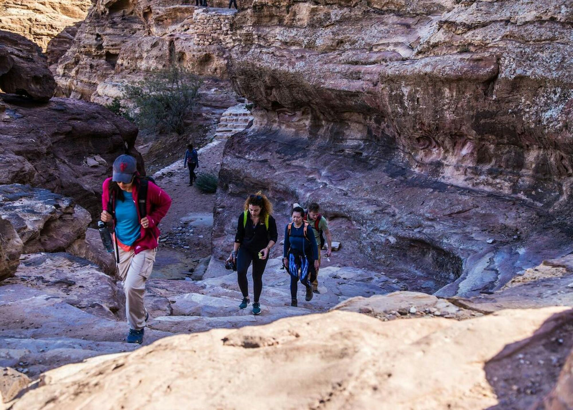 hikers carrying essentials on jordan trails