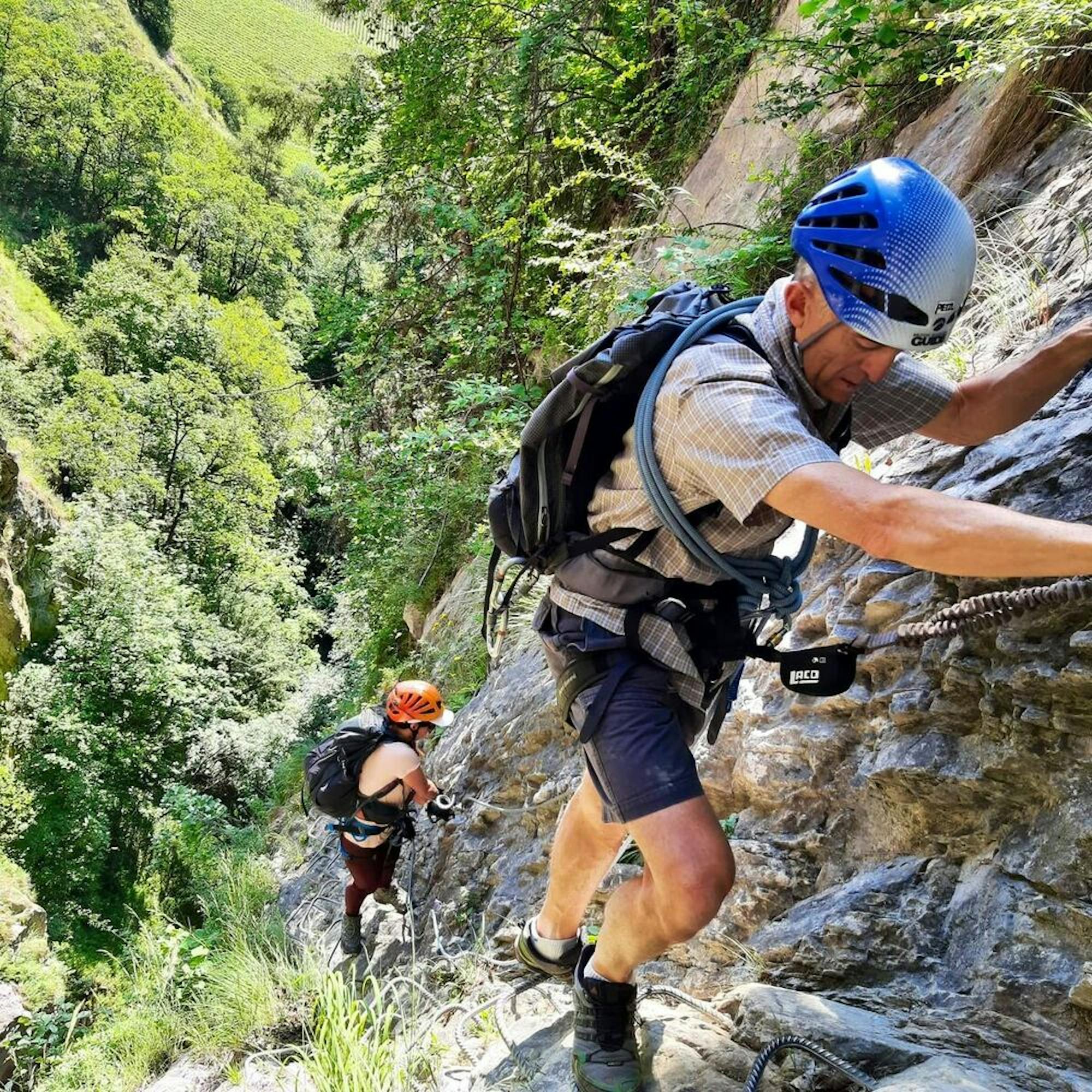older climber on swiss via ferrata