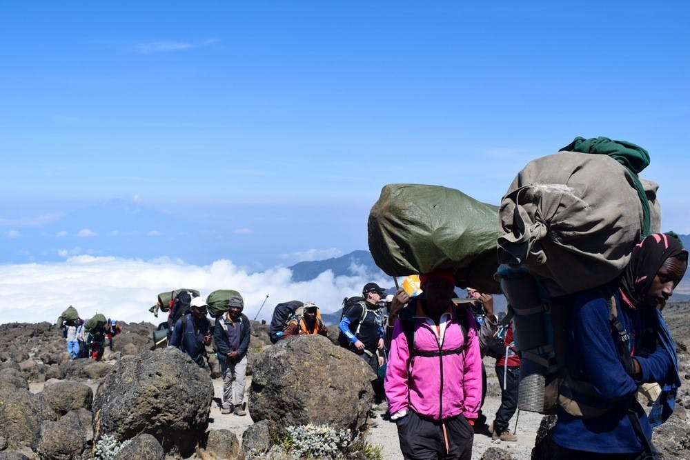 Kili porters carrying equipment