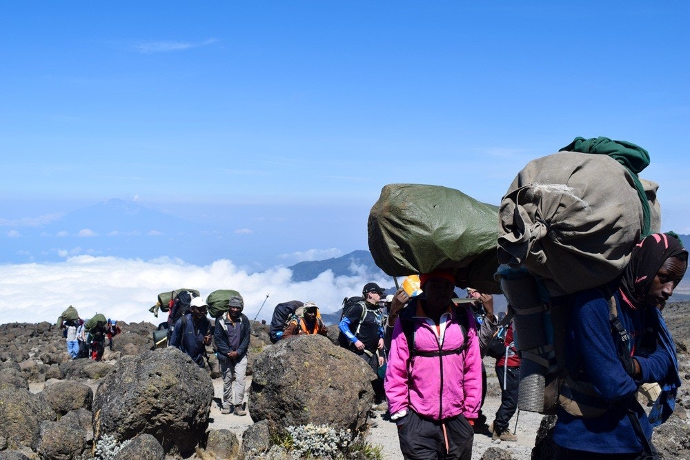 Kili porters carrying equipment