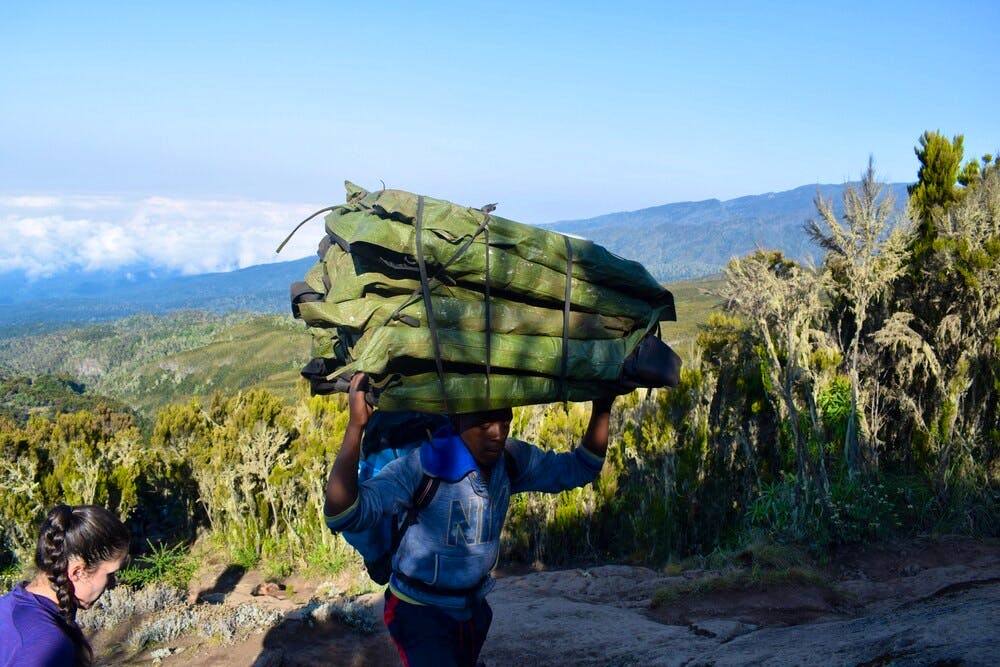 Porters carrying kit